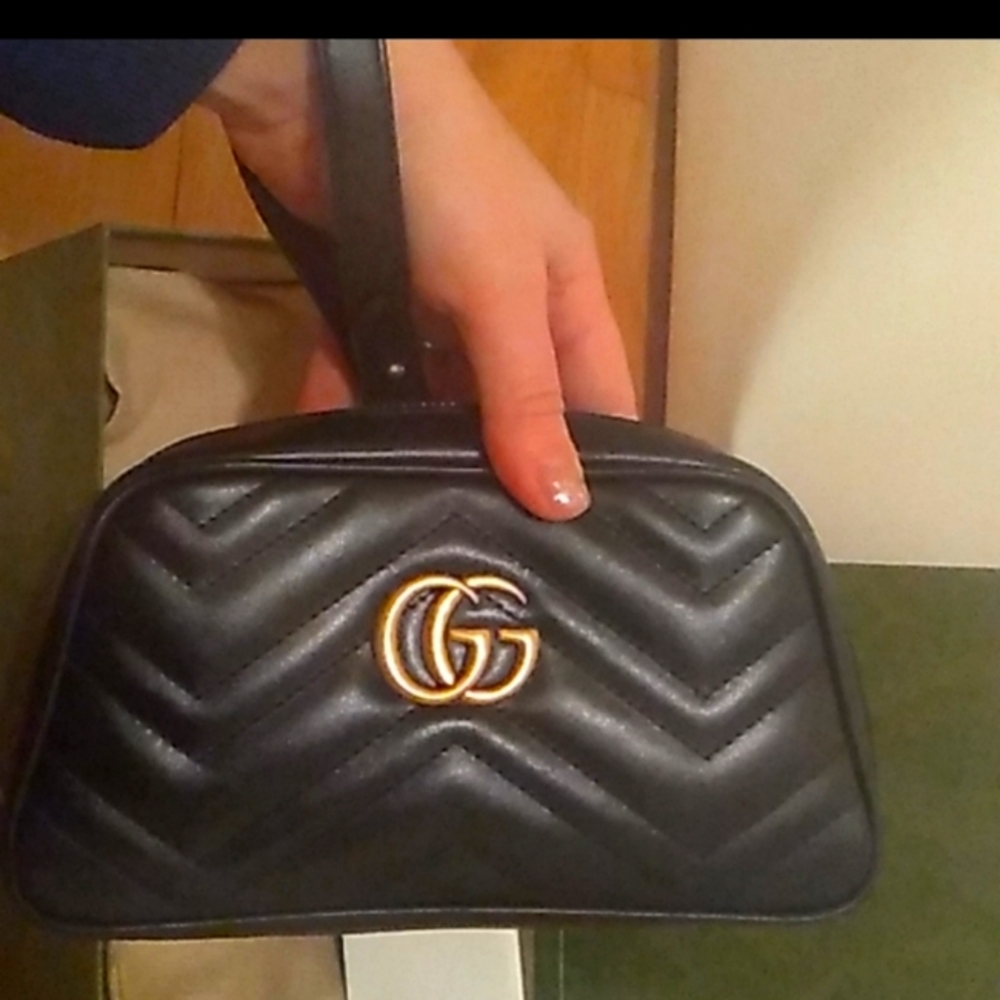 Gucci Black and Gold Clutch